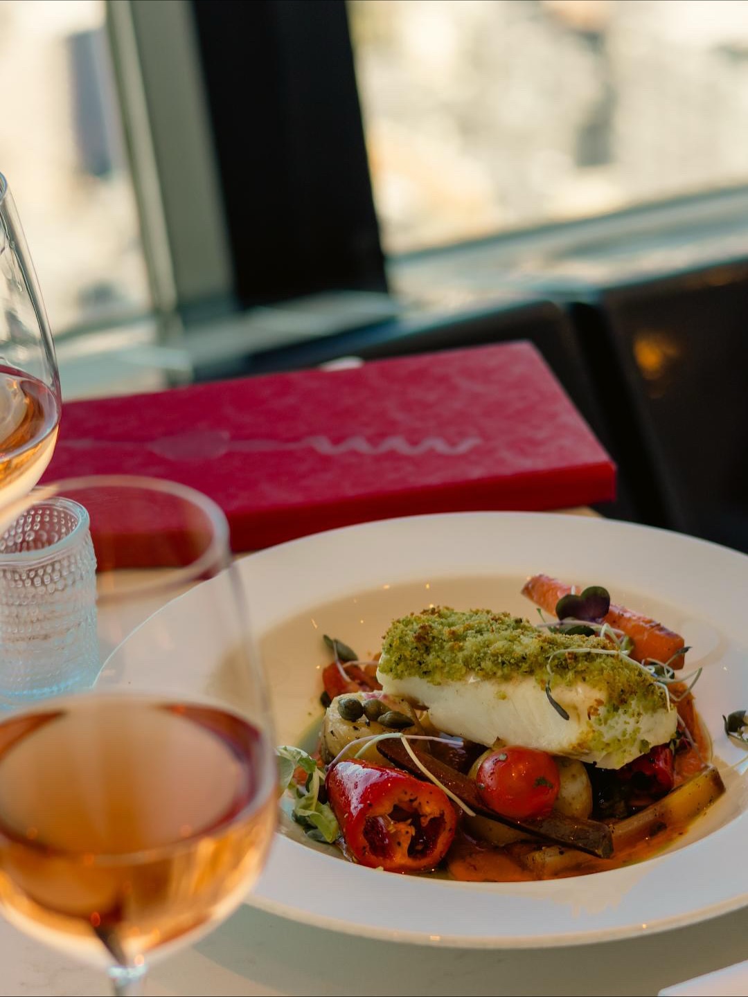 Herb-crusted fish and rosé with city views at 360 Restaurant