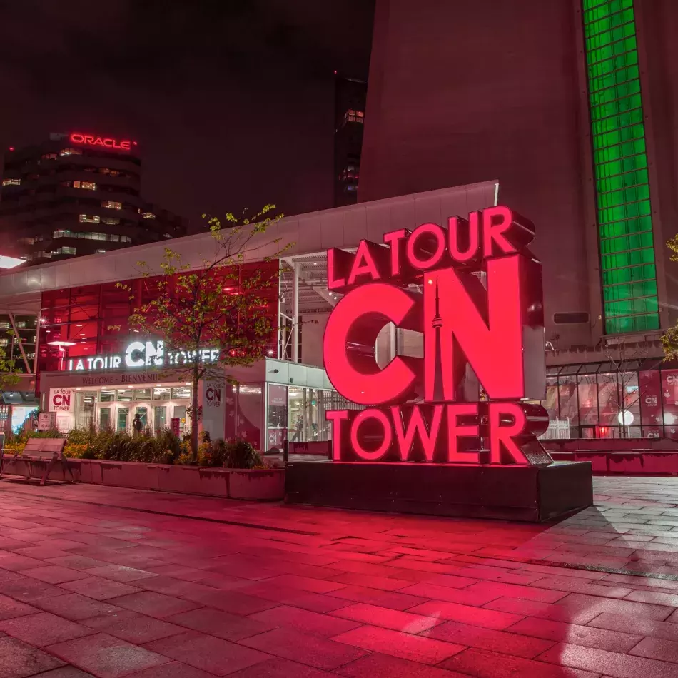 The CN Tower sign outside, at the base of the tower.