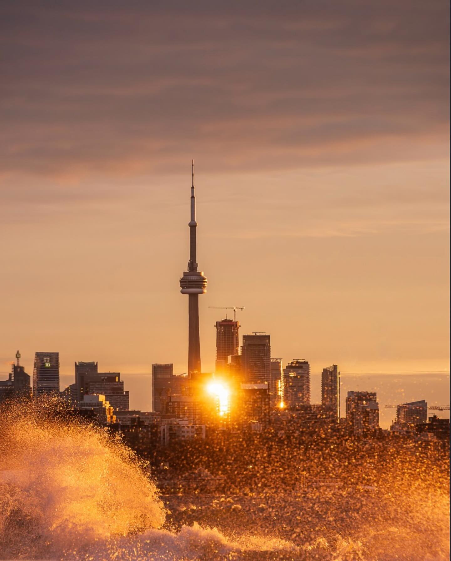 Sunlight and Toronto skyline with the CN Tower