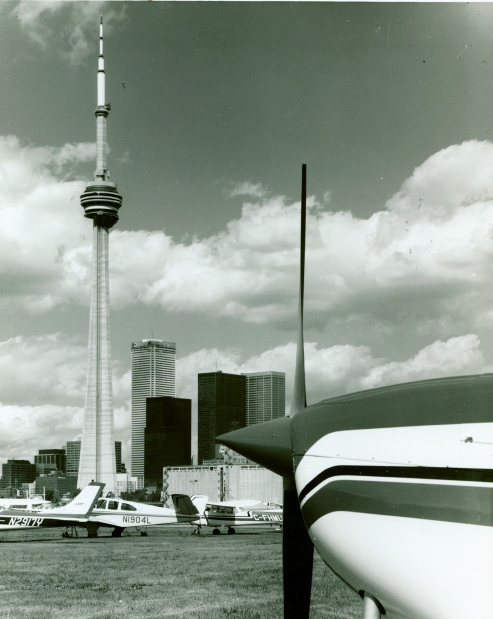 CN Tower viewed past an airplane